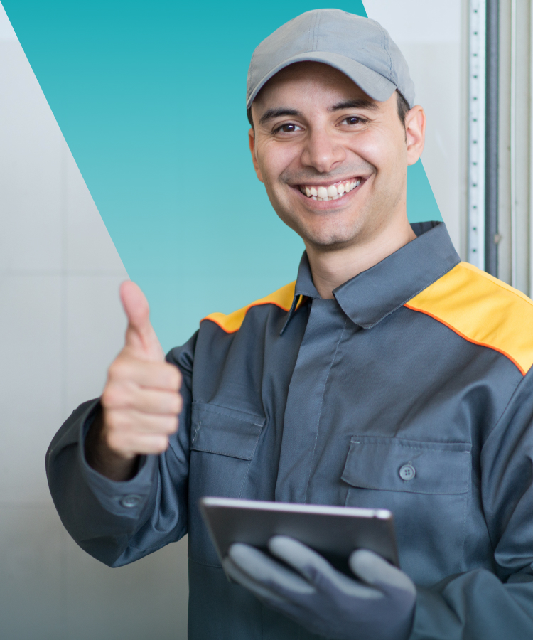 Smiling Solavita technician giving thumbs-up while holding tablet for solar system inspection